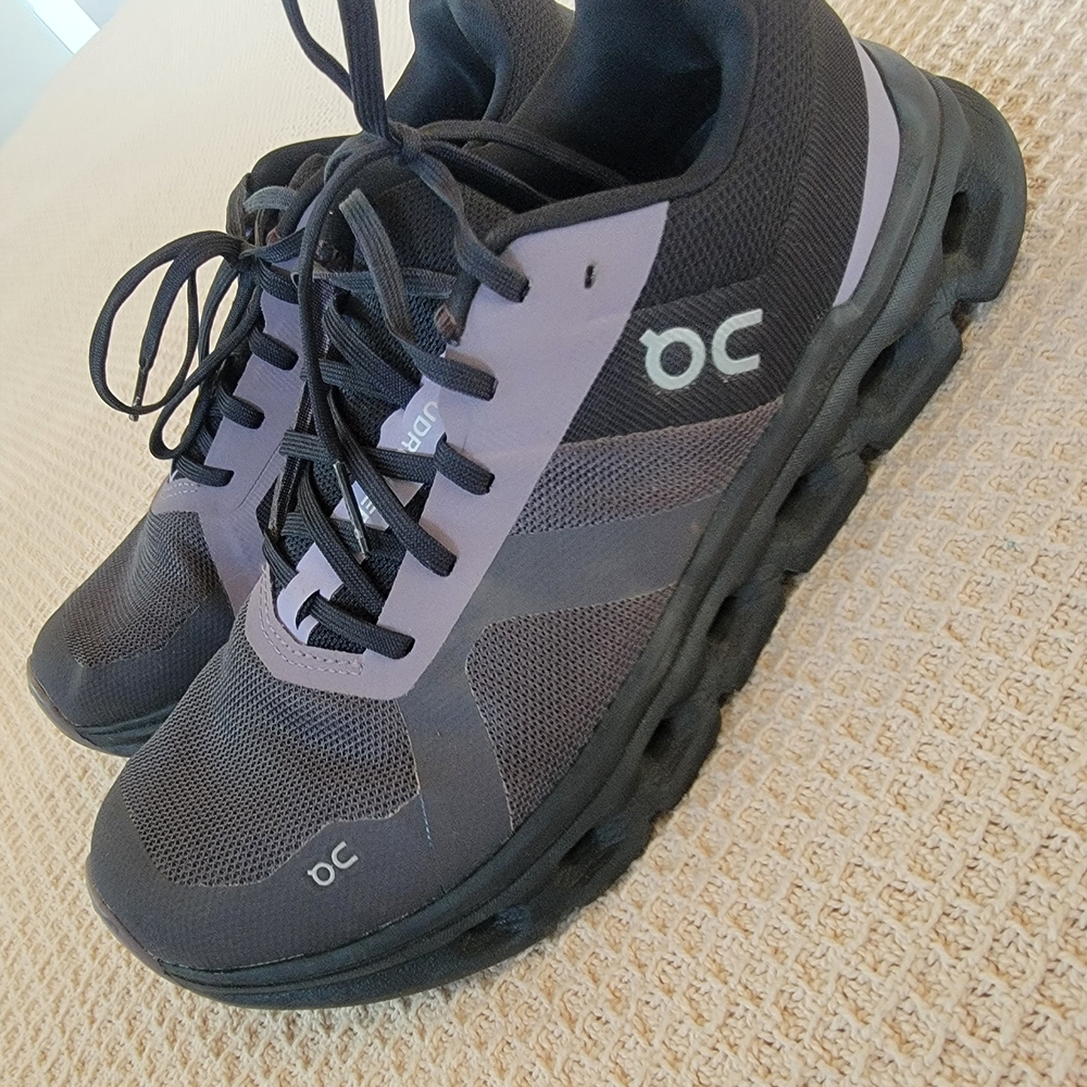 On Running Black and Gray Athletic Shoes with CloudTec Cushioning